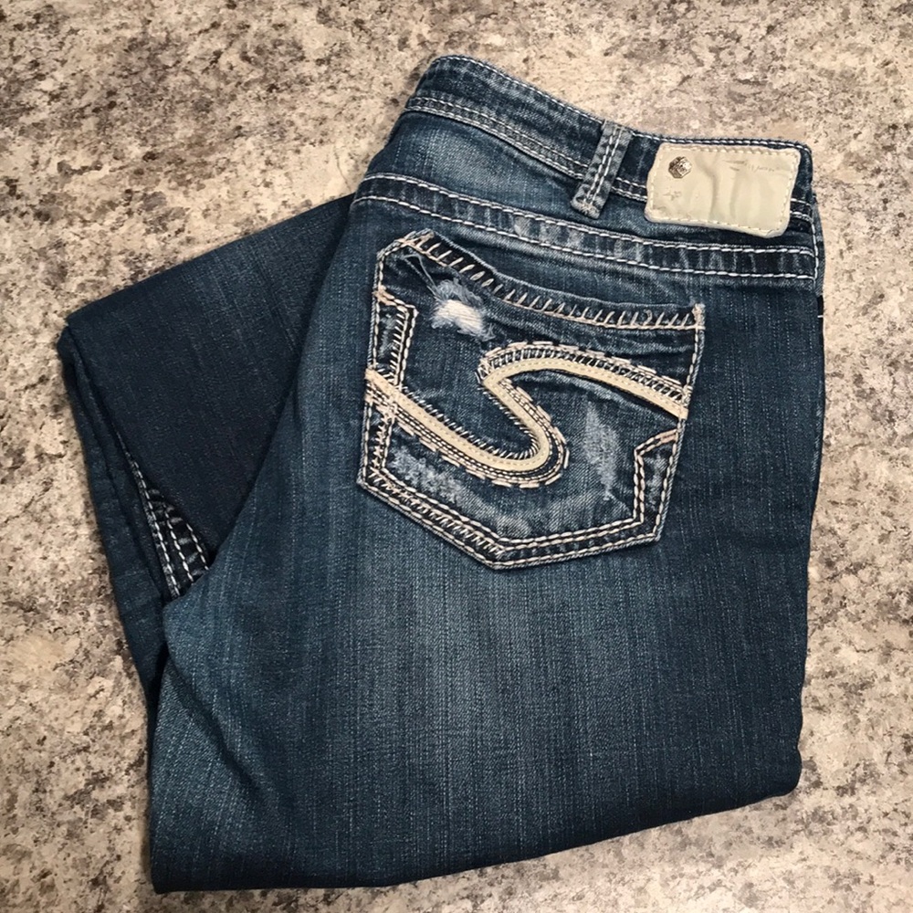 Woman’s silver jeans